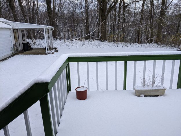 april snow on my deck and back yard