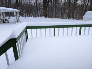 deep snow covers deck and yard